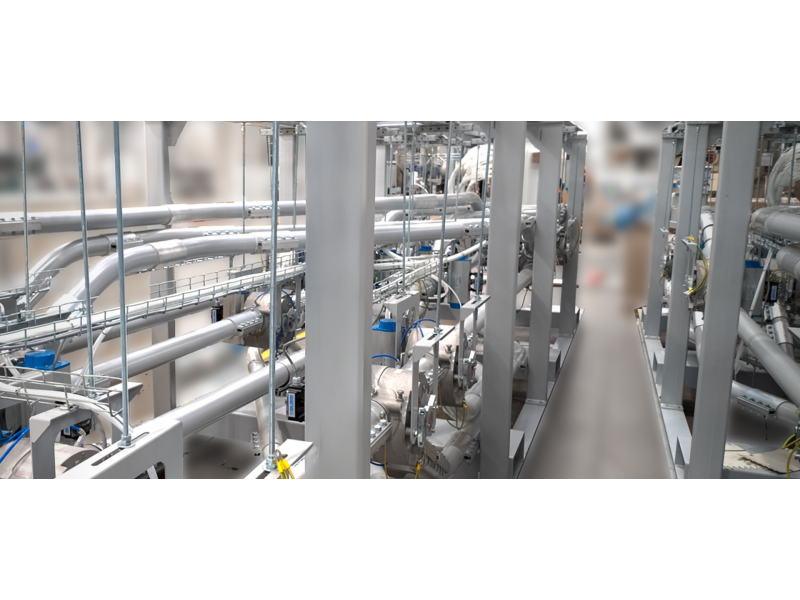Feeding system to pouch maker